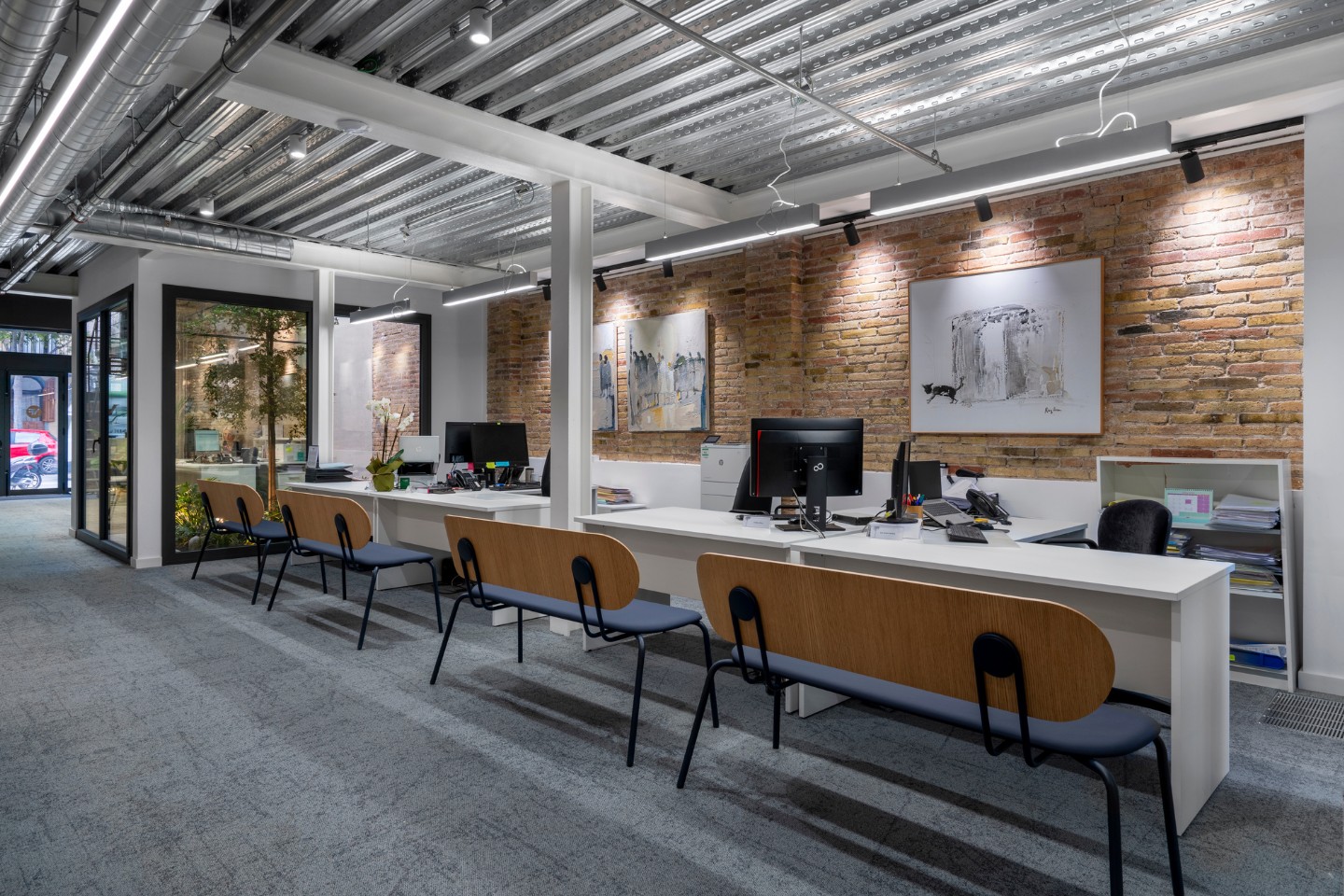 Pere Serra Arquitectura. Rehabilitació de nau industrial al carrer Pujades